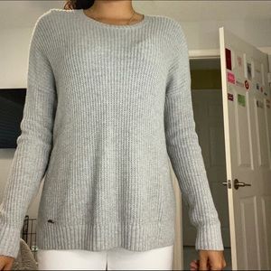 A gray long sleeved sweatshirt